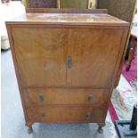 WALNUT TALL BOY WITH 2 PANEL DOORS OVER 2 DRAWERS ON QUEEN ANNE SUPPORTS