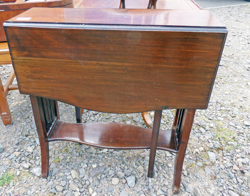 MAHOGANY SUTHERLAND TABLE ON SHAPED SUPPORTS