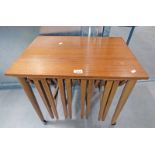 TEAK NEST OF 4 TABLES Condition Report: Overall good condition.