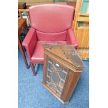 MAHOGANY CORNER CABINET AND RED LEATHER ARMCHAIR