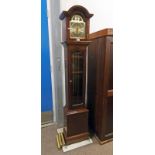 20TH CENTURY MAHOGANY AND GLASS LONGCASE CLOCK WITH BRASS AND SILVERED DIAL SIGNED THOMAS BYRNE