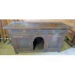 OAK SIDEBOARD WITH 2 LONG DRAWERS OVER 2 PANEL DOORS WITH CARVED DECORATION