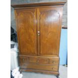 EARLY 20TH CENTURY MAHOGANY WARDROBE WITH 2 PANEL DOORS OVER 3 SHORT AND 1 LONG DRAWER ON SHAPED