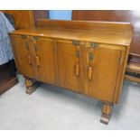 20TH CENTURY OAK SIDEBOARD WITH 4 PANEL DOORS ON TURNED SUPPORTS