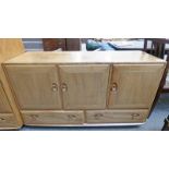 ERCOL SIDEBOARD WITH 3 PANEL DOORS OVER 2 DRAWERS 130CM LONG