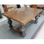 EARLY 20TH CENTURY OAK PULL-OUT REFECTORY DINING TABLE ON BALUSTER SUPPORTS 246CM LONG EXTENDED