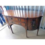 20TH CENTURY MAHOGANY SIDEBOARD WITH SHAPED FRONT AND 2 CENTRALLY SET DRAWERS FLANKED BY 2 PANEL