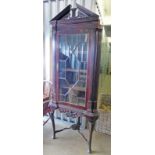 19TH CENTURY MAHOGANY CORNER CABINET WITH DECORATIVE CARVED BASE