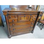 19TH CENTURY MAHOGANY OGEE CHEST OF 4 SHORT OVER 3 LONG DRAWERS FLANKED BY TURNED COLUMNS ON PLINTH