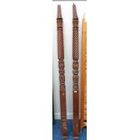 PAIR OF MAHOGANY PILLARS WITH CARVED DECORATION - 217CM LONG