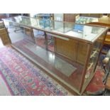 EARLY 20TH CENTURY MAHOGANY SHOPS DISPLAY CASE GLASS PANELS TO FRONT, TOP AND SIDES,