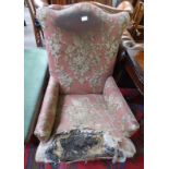 19TH CENTURY OVERSTUFFED ARMCHAIR ON TURNED SUPPORTS