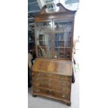 EARLY 20TH CENTURY MAHOGANY CABINET WITH 2 ASTRAGAL GLASS DOORS AND SHELVED INTERIOR OVER FALL