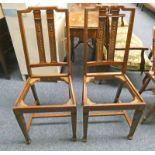 TWO OAK DINING CHAIRS WITH CARVED DECORATION