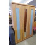 BEECH 2 DOOR WARDROBE WITH CENTRALLY SET MIRROR & GLASS PANELS.