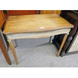 EARLY 20TH CENTURY MAHOGANY TABLE WITH SHAPED TOP ON SQUARE REEDED SUPPORTS