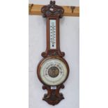 CARVED OAK WALL BAROMETER WITH WHITE DIALS Condition Report: No temperature vile