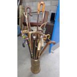 BRASS STICKSTAND AND SELECTION OF WALKING STICKS