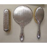 SILVER 3 PIECE DRESSING TABLE SET TO INCLUDE 2 BRUSHES & HAND MIRROR,