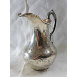 SILVER JUG WITH ENGRAVED DECORATION LONDON 1857 Condition Report: Height: 13.
