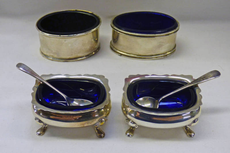 4 OVAL SILVER SALTS WITH BLUE GLASS LINERS AND 2 SILVER SPOON