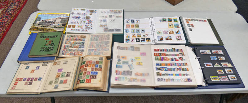 GOOD SELECTION OF WORLDWIDE MINT AND USED STAMPS IN 11 ALBUMS TO INCLUDE LAOS, TURKEY,