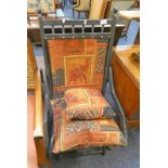 LATE 19TH CENTURY EBONISED CAMPAIGN FOLDING ARMCHAIR & OAK OPEN ARMCHAIR ON TURNED SUPPORTS