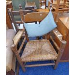 19TH CENTURY OAK RUSTIC OPEN ARMCHAIR ON TURNED SUPPORTS WITH RUSH WORK SEAT