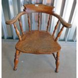 EARLY 20TH CENTURY CAPTAIN'S ARMCHAIR ON TURNED SUPPORTS