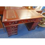 20TH CENTURY MAHOGANY KNEEHOLE DESK WITH LEATHER TOP & CENTRALLY SET DRAWER FLANKED BY 2 COLUMNS OF