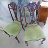 2 MAHOGANY SIDE CHAIRS WITH CARVED DECORATION CIRCA 1900