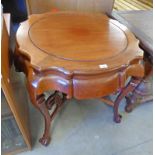 20TH CENTURY CHINESE MAHOGANY CIRCULAR TOPPED TABLE OF SHAPED SUPPORTS, MAX.