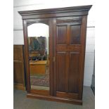 LATE 19TH CENTURY WALNUT DOUBLE MIRROR DOOR WARDROBE ON PLINTH BASE 211CM TALL