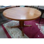 TEAK EXTENDING DINING TABLE