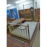 BRASS BED WITH DECORATIVE ENDS,