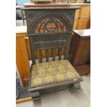 LATE 19TH CENTURY OAK HALL CHAIR WITH CARVED DECORATION,