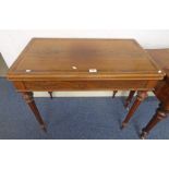 19TH CENTURY ROSEWOOD TURNOVER GAMES TABLE WITH CROSS BANDING ON TURNED REEDED SUPPORTS