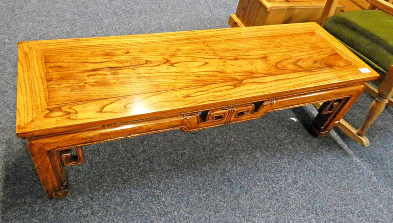 CHINESE HARDWOOD LOW TABLE ON SHAPED SUPPORTS - LENGTH 112CM