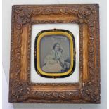 FRAMED AMBROTYPE OF A MOTHER WITH CHILD, COLOURED SECTIONS,