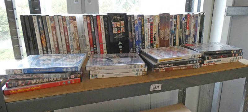 SHELF OF DVD'S