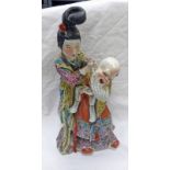 19TH/20TH CENTURY CHINESE POTTERY FIGURE GROUP OF WOMAN & LAUGHING PRIEST WITH 2 SEAL MARKS