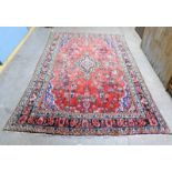 RED GROUND PERSIAN SAROUK CARPET WITH TRADITIONAL FLORAL DESIGN 300 X 210CM