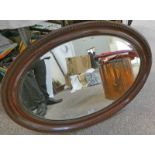 MAHOGANY FRAMED OVAL WALL MIRROR,