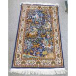 MIDDLE EASTERN STYLE WALL HUNG RUG DEPICTING A HUNTING SCENE 80 X 130CM