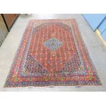 BURNT ORANGE AND BLUE GROUND IRANIAN CARPET SENADASH DESIGN 275 X 190CM