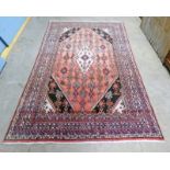 WASHED RED GROUND PERSIAN SUROK CARPET 395 X 193CM