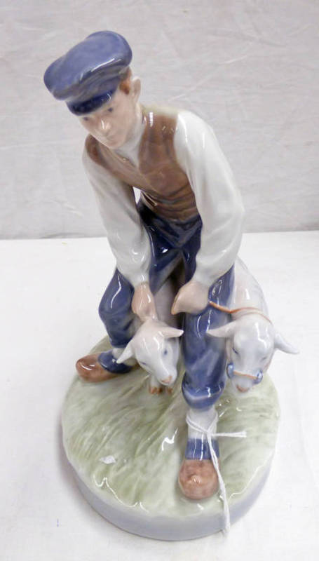 ROYAL COPENHAGEN FIGURE GROUP DEPICTING A FARMER WITH TWO SHEEP 20CM TALL