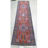RED AND BLUE GROUND PERSIAN HENRIES RUNNER WITH MEDALLION DESIGN 350 X 100CM