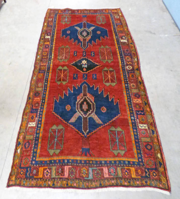 OLD PERSIAN HAMADAN LAURIE RED GROUND WITH A BESPOKE MEDALLION DESIGN 180 X 138CM
