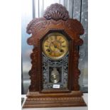 LATE 19TH CENTURY/EARLY 20TH CENTURY AMERICAN MANTLE CLOCK WITH DECORATIVE CARVED BASE